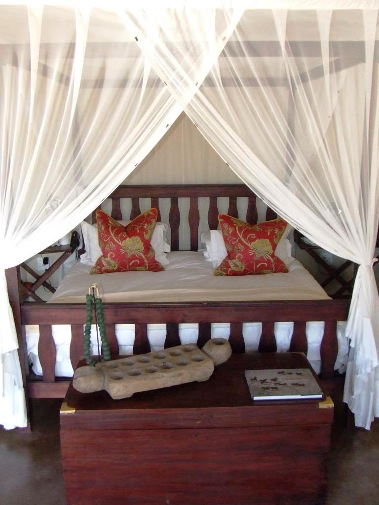 Front view of a king-sized bed at Kukama